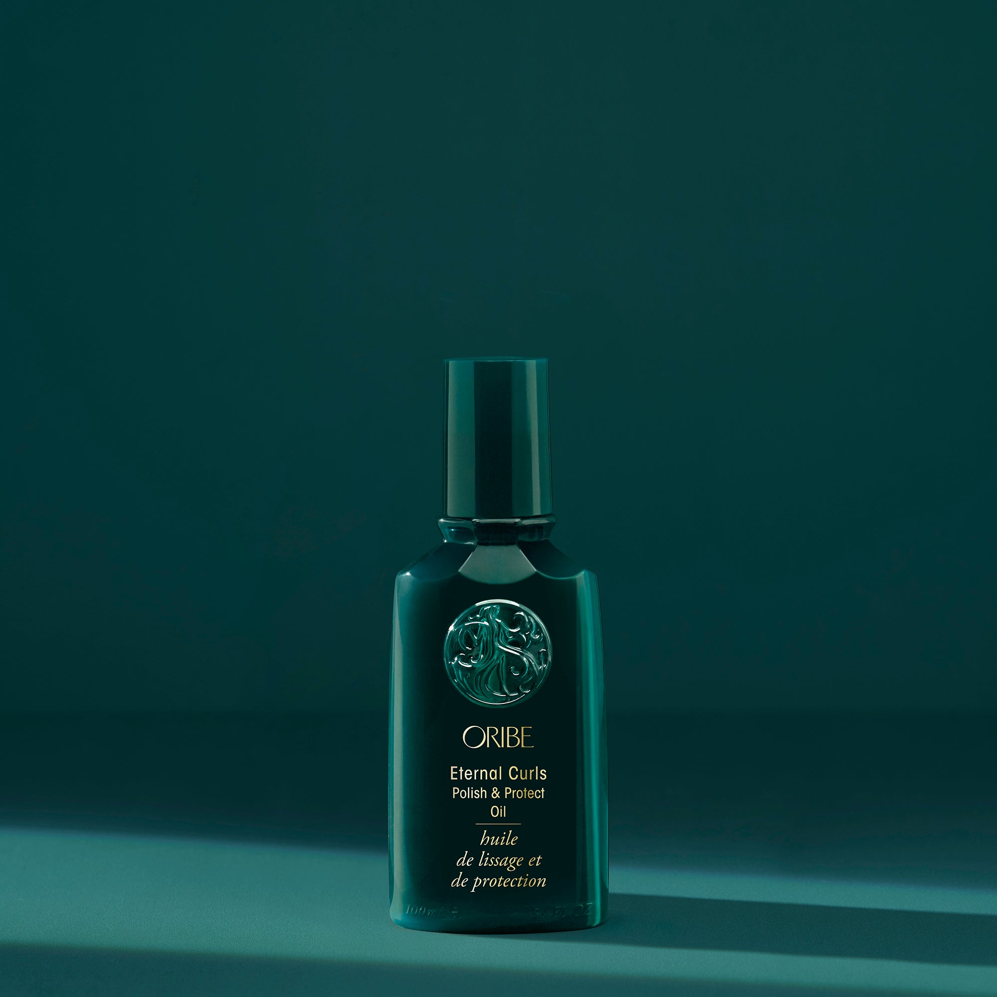 Oribe Eternal Curls Polish & Protect Oil (Giliai maitinantis aliejus garbanoms)