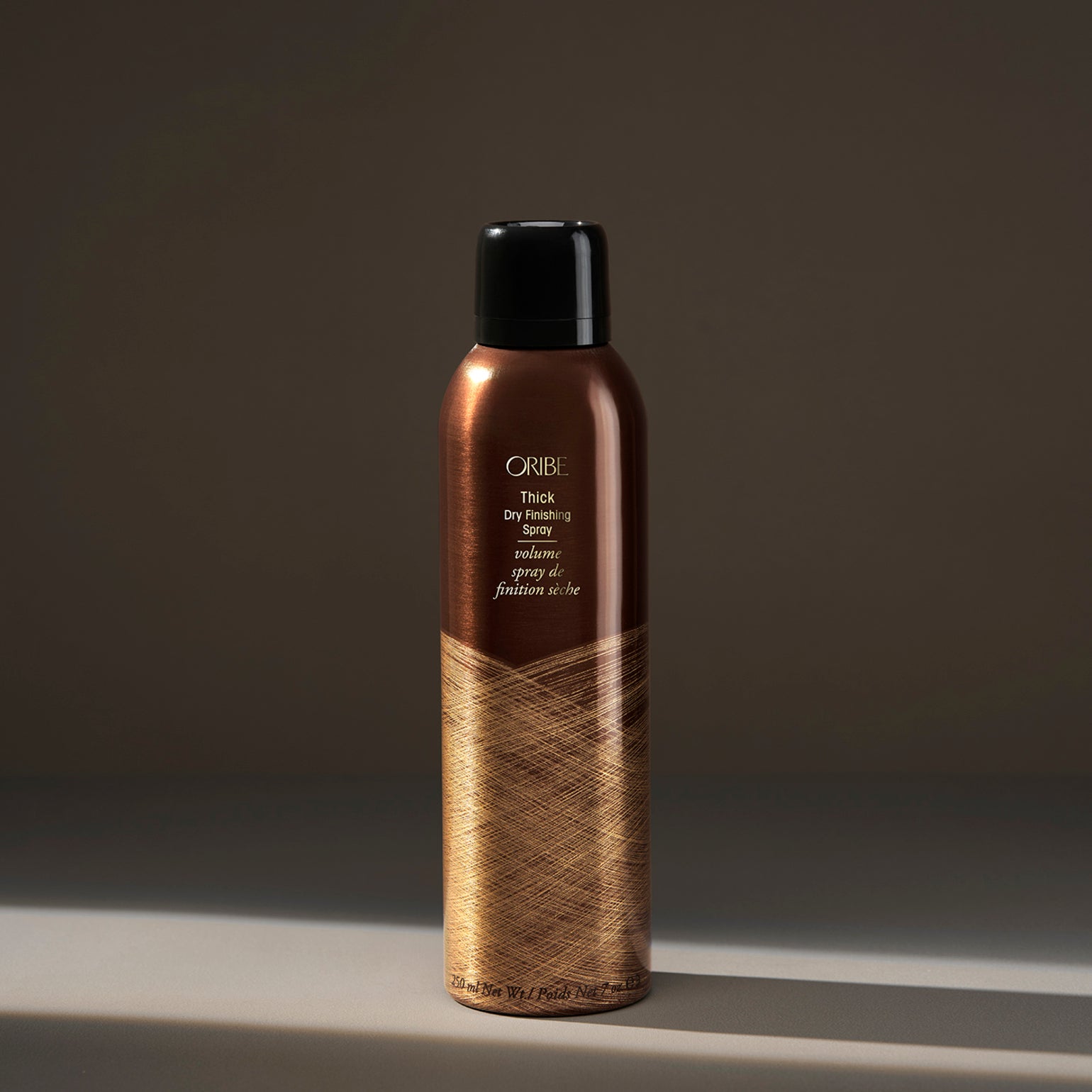 Oribe Thick-Dry Finishing Spray (Apimties suteikiantis sausas purškalas)