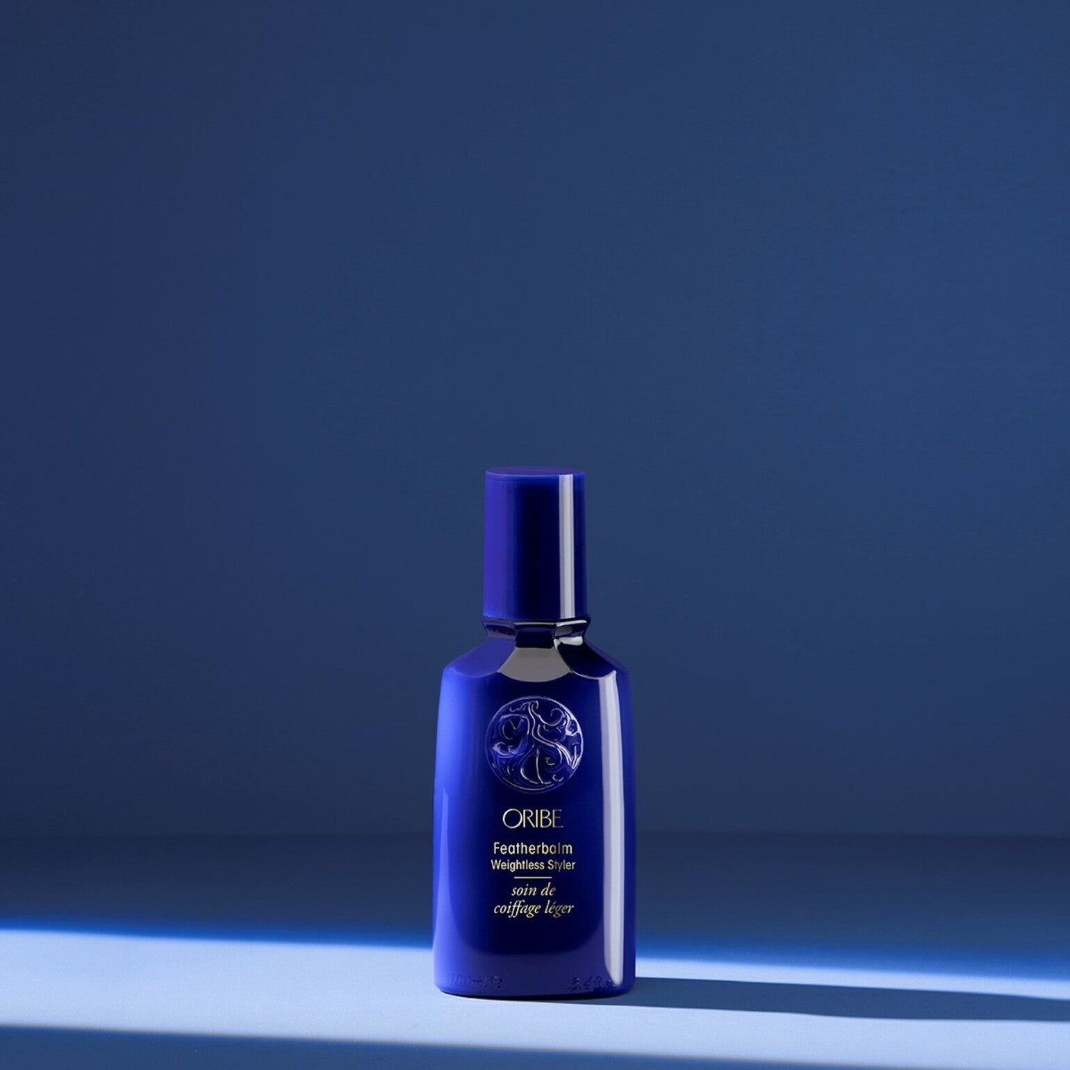 Oribe Featherbalm Weightless Styler (Kremas ploniems plaukams)